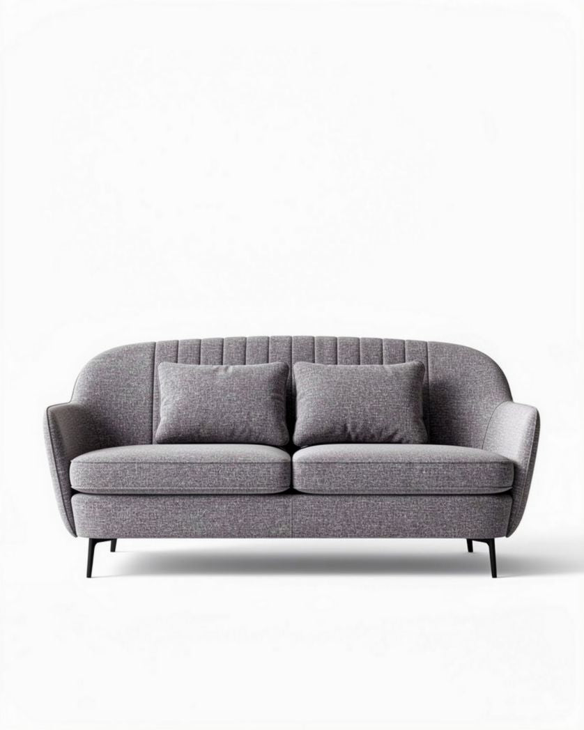 Grijs stoffen bank met extra kussens en afmetingen van 175 x 80 x 85cm